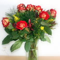 Bouquet of roses and greenery in vase