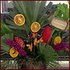 Holiday arrangement with palm fronds and dried fruit